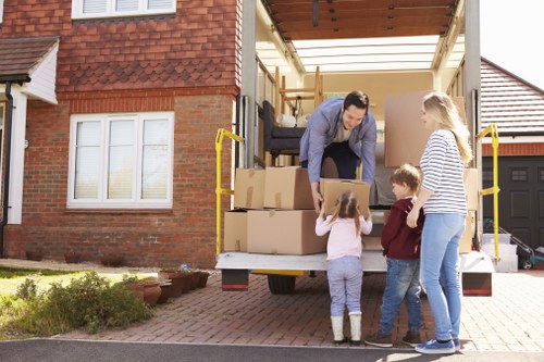 Moving crew handling a local business relocation near Bow