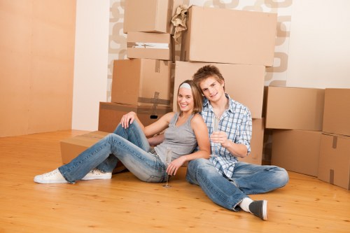 Man and van loading boxes for a home move in Bow