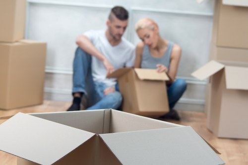 Loading household furniture into a removal truck for a Bow relocation
