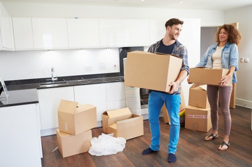 Office furniture and equipment prepared for a move in Bow