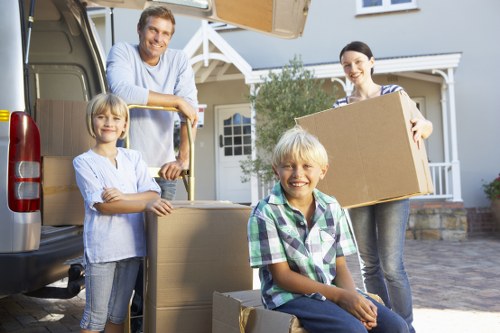 Moving day checklist and prepared boxes for removal services in Bow