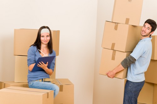 Preparation checklist for furniture removals in Bow beside packed household items
