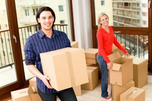 Moving boxes and student belongings in a Bow apartment building